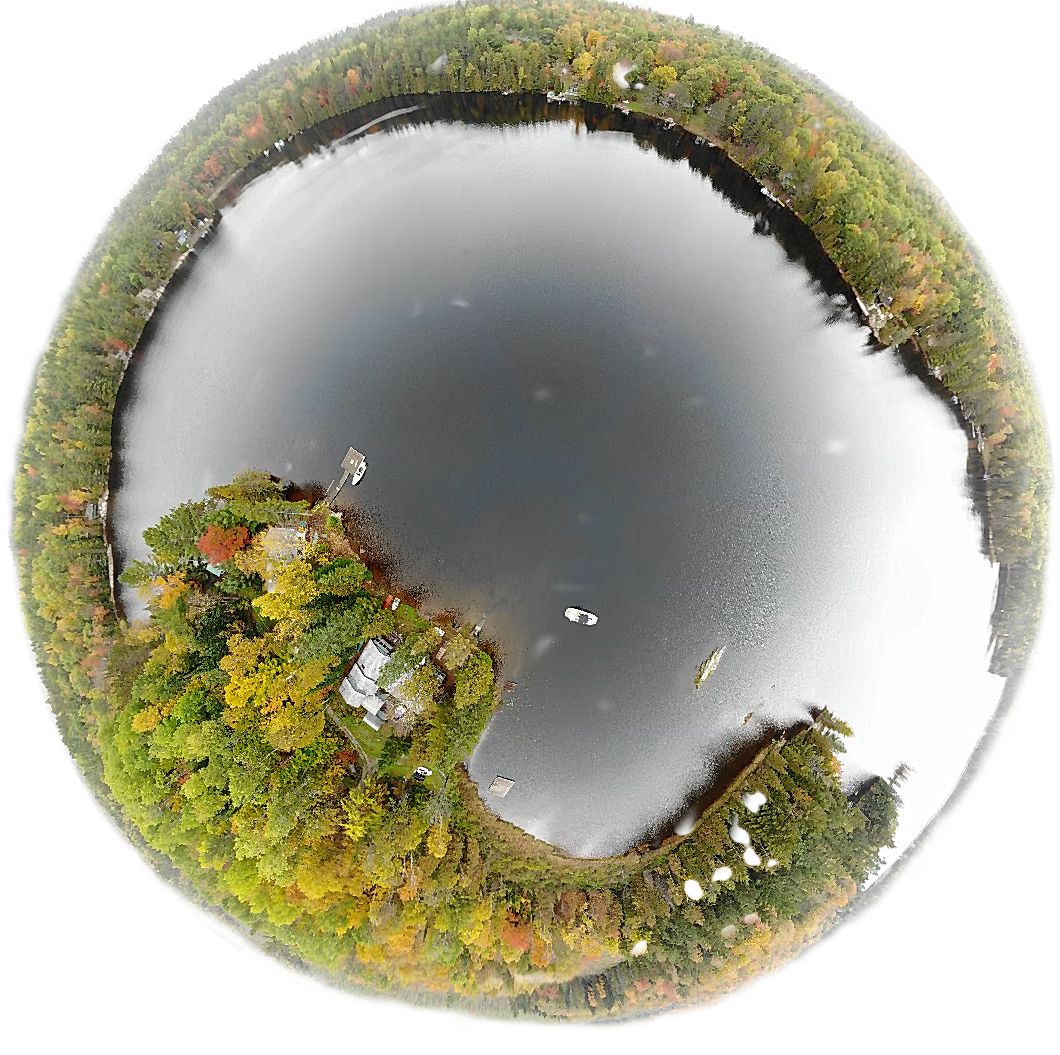 drone picture overlooking a like in a world like view